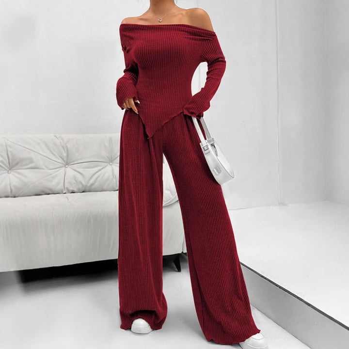 Damer figurnära jumpsuit med asymmetrisk halsringning och långa ärmar Mirla-Eva Jonsson