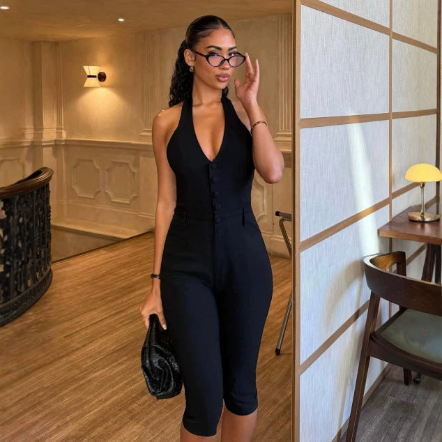 Damer figurnära jumpsuit med elegant halterneck och knapplist Mirla-Eva Jonsson