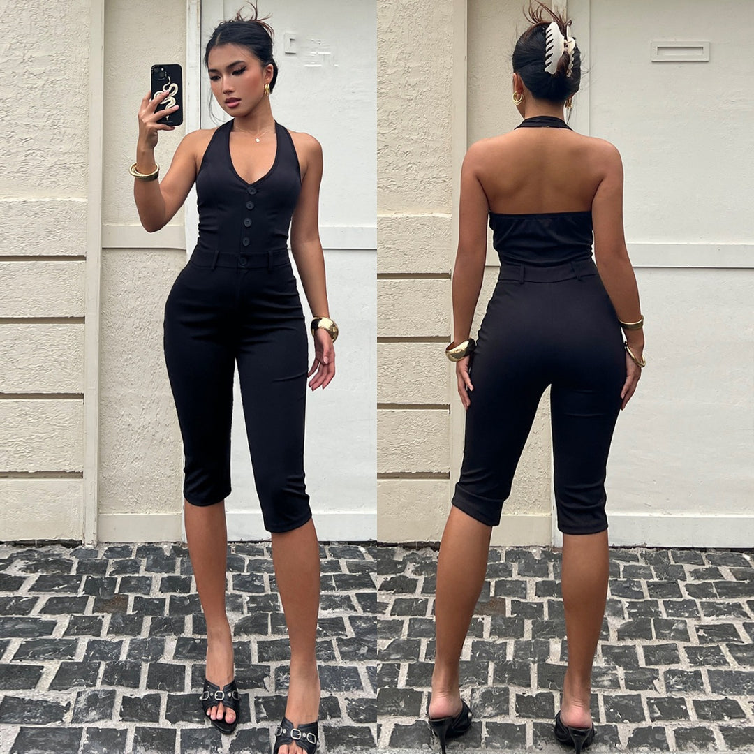 Damer figurnära jumpsuit med elegant halterneck och knapplist Mirla-Eva Jonsson