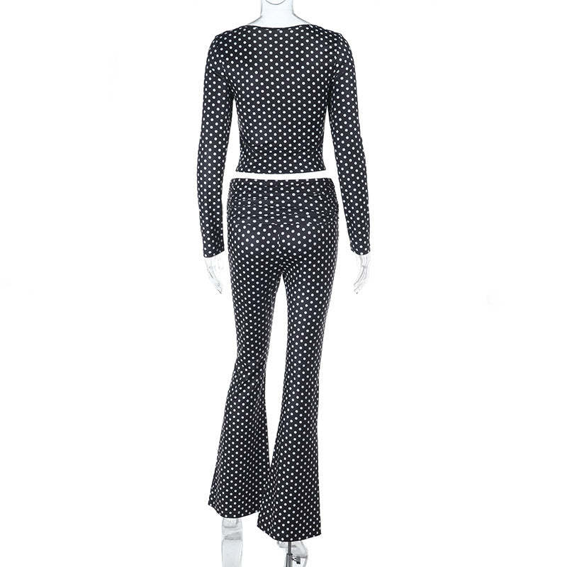 Damer figurnära jumpsuit med långa ärmar och polka-prick mönster Mirla-Eva Jonsson