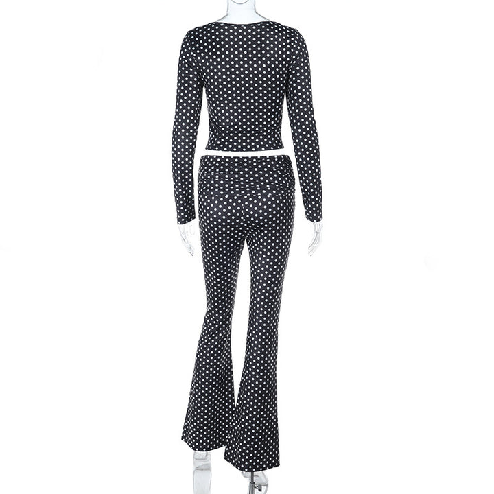 Damer figurnära jumpsuit med långa ärmar och polka-prick mönster Mirla-Eva Jonsson