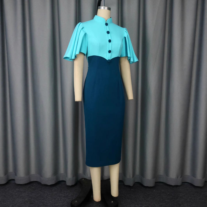 Damer figurnära klänning med elegant ståkrage och konstfulla puffärmar Mirla-Eva Jonsson
