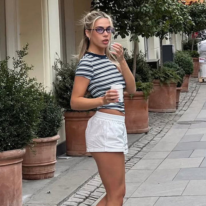 Damer figurnära randiga t-shirt med rund halsringning Mirla-Eva Jonsson