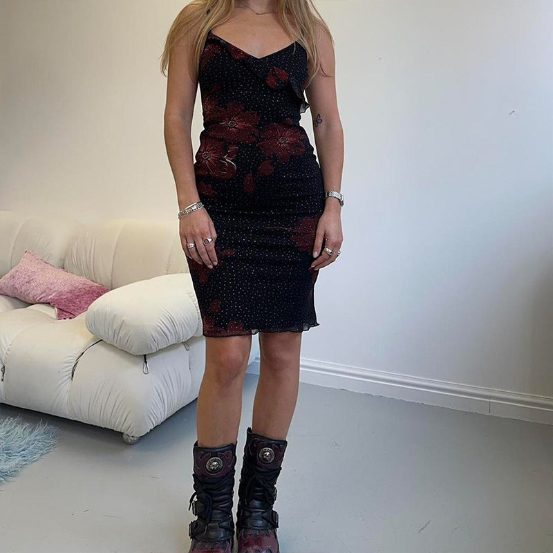 Damer figurnära sommardress med ruffledetaljer och blommönster Mirla-Eva Jonsson