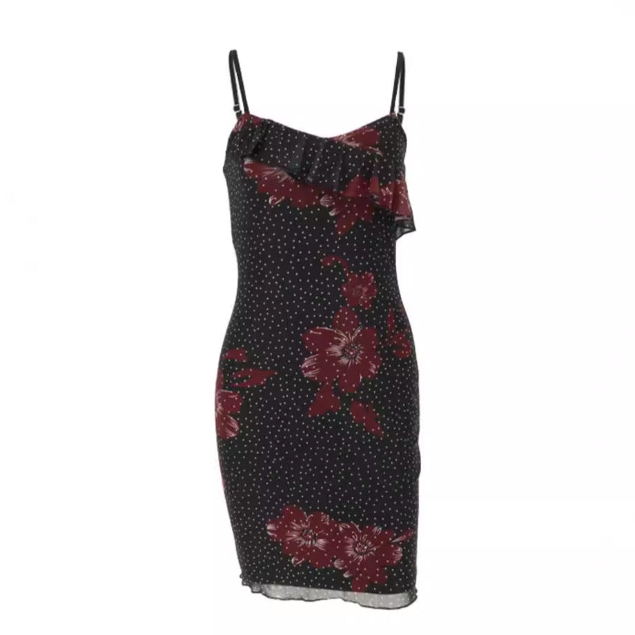 Damer figurnära sommardress med ruffledetaljer och blommönster Mirla-Eva Jonsson