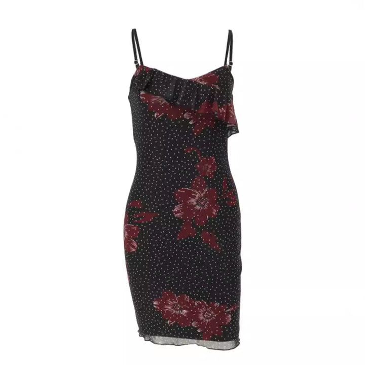 Damer figurnära sommardress med ruffledetaljer och blommönster Mirla-Eva Jonsson