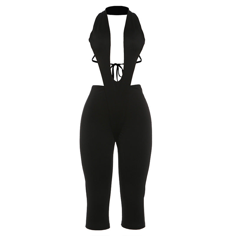 Damer figursydd jumpsuit med djup V-ringning och knytbälte Mirla-Eva Jonsson