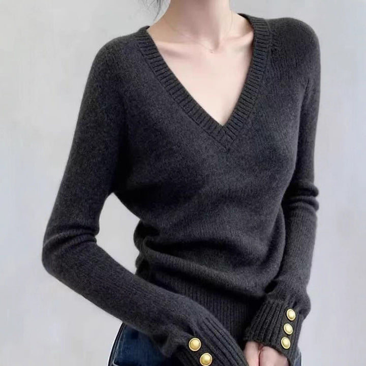 Damer fin V-ringad tröja med eleganta knappp Detaljer Mirla-Eva Jonsson