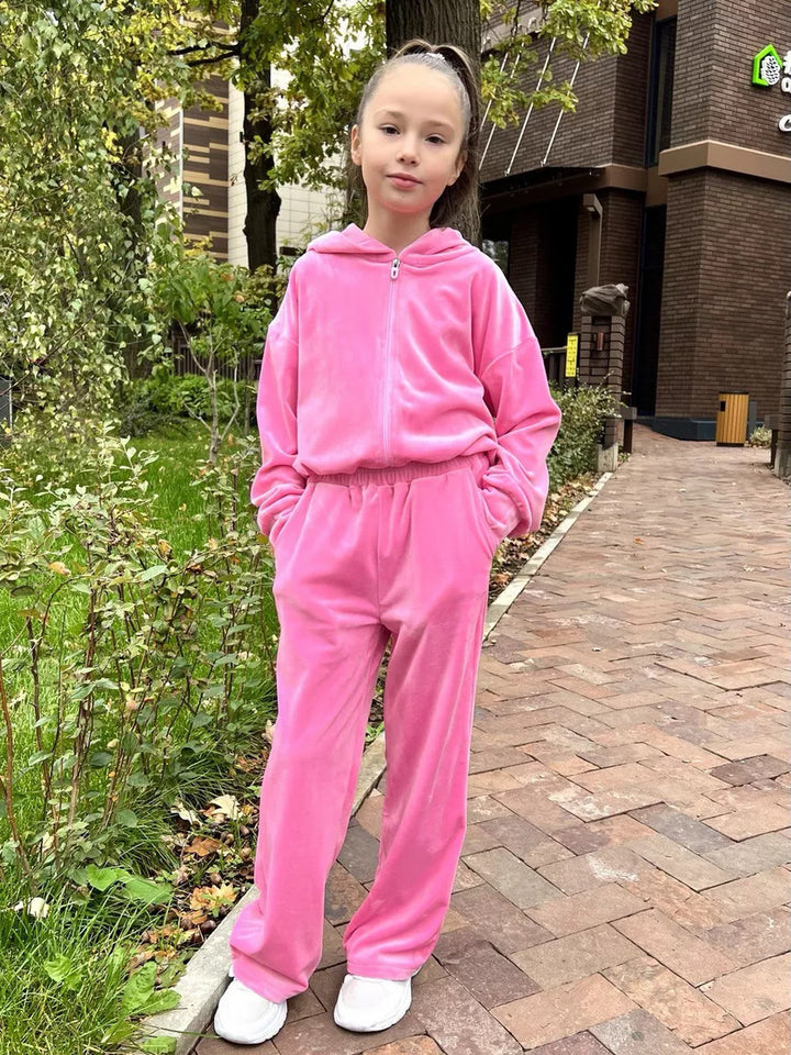 Damer fleece-sportdräkt med hoodiejacka och vida byxor Mirla-Eva Jonsson