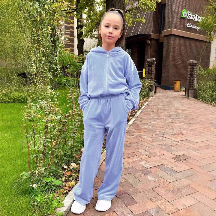 Damer fleece-sportdräkt med hoodiejacka och vida byxor Mirla-Eva Jonsson