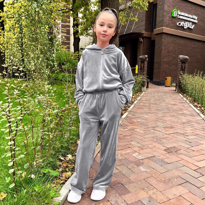 Damer fleece-sportdräkt med hoodiejacka och vida byxor Mirla-Eva Jonsson