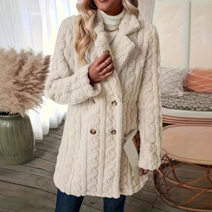 Damer fleece-vinterjacka med strukturerad design och eleganta knappar Mirla-Eva Jonsson