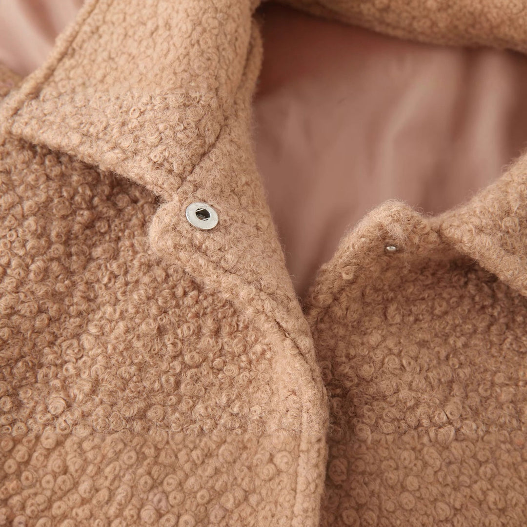 Damer fluffig teddyjacka med sidofickor och elegant krage Mirla-Eva Jonsson