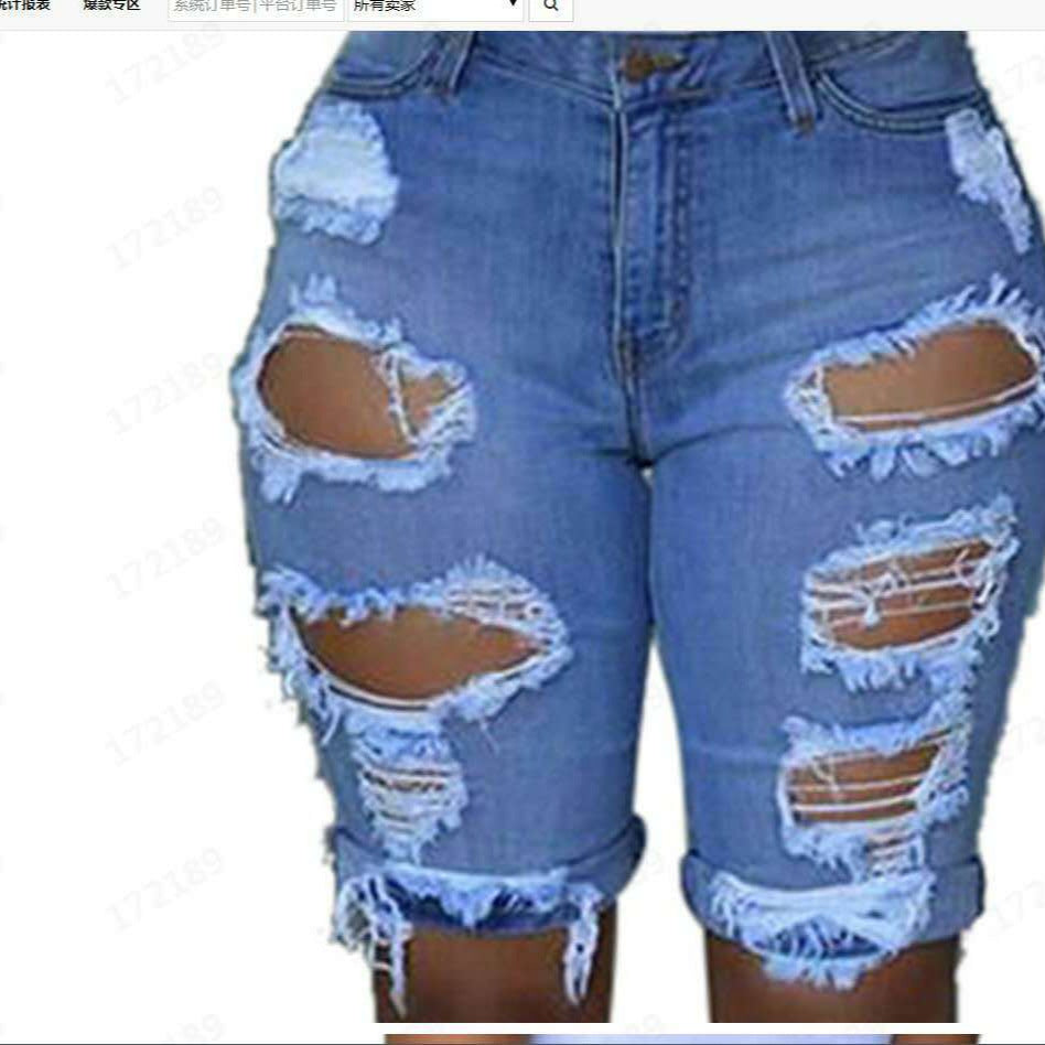Damer förstörda denimbyxor med avslappnad passform och trendiga revärddetaljer Mirla-Eva Jonsson