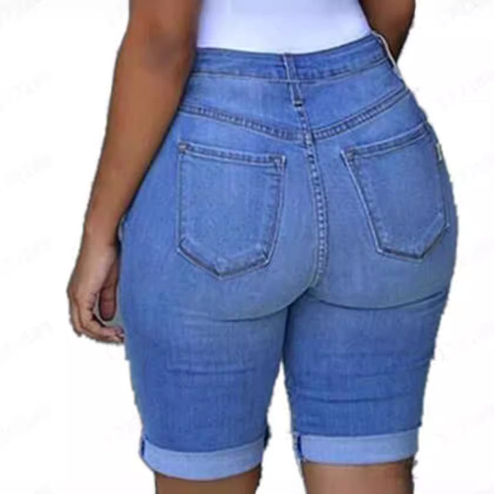 Damer förstörda denimbyxor med avslappnad passform och trendiga revärddetaljer Mirla-Eva Jonsson