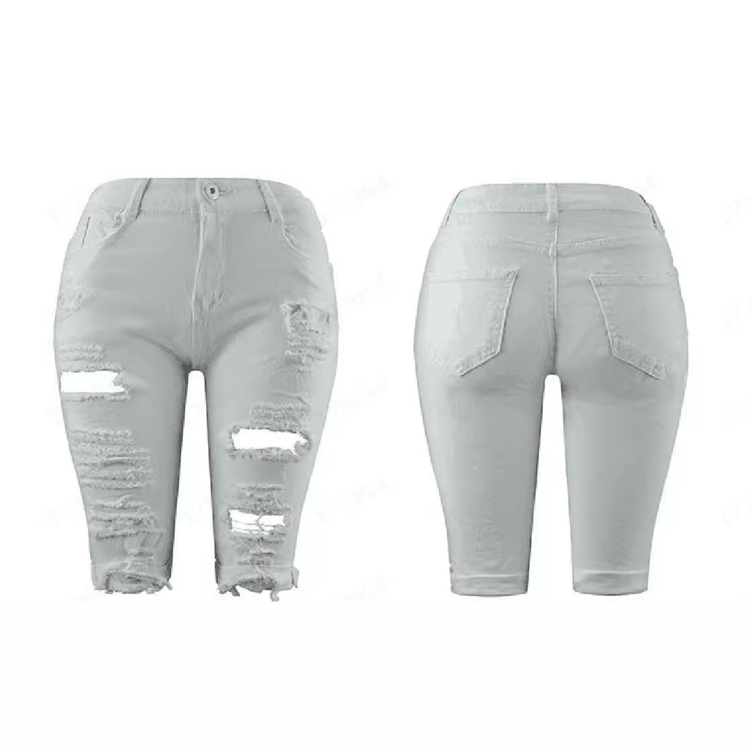 Damer förstörda denimbyxor med avslappnad passform och trendiga revärddetaljer Mirla-Eva Jonsson