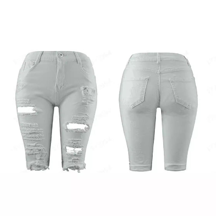 Damer förstörda denimbyxor med avslappnad passform och trendiga revärddetaljer Mirla-Eva Jonsson