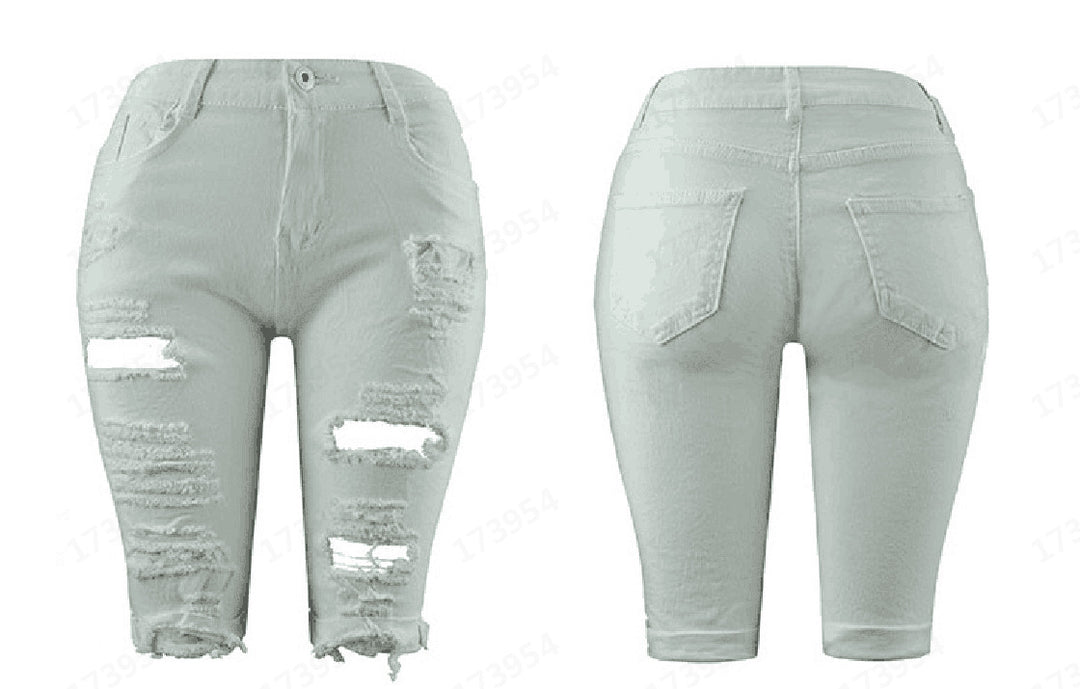 Damer förstörda denimbyxor med avslappnad passform och trendiga revärddetaljer Mirla-Eva Jonsson