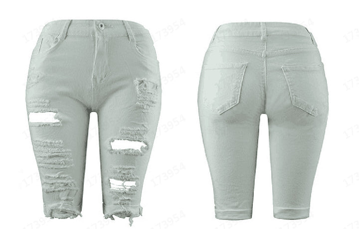 Damer förstörda denimbyxor med avslappnad passform och trendiga revärddetaljer Mirla-Eva Jonsson