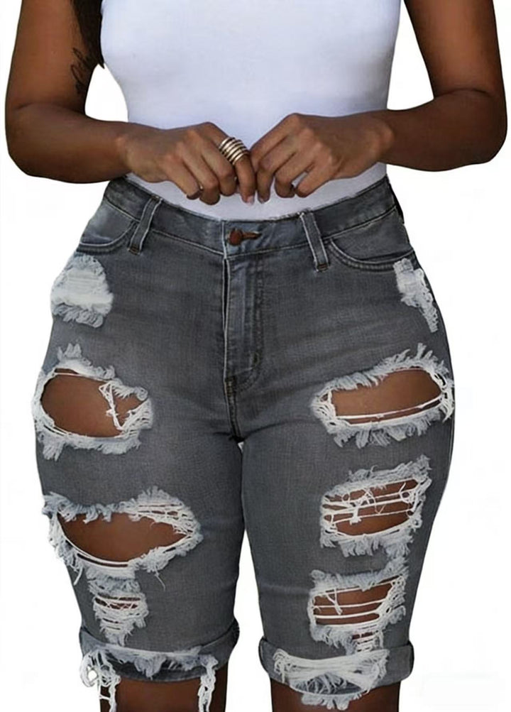 Damer förstörda denimbyxor med avslappnad passform och trendiga revärddetaljer Mirla-Eva Jonsson