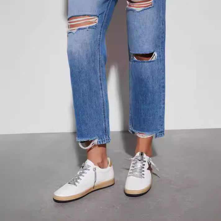Damer förstörda jeans i moderiktig bootcut-stil Mirla-Eva Jonsson