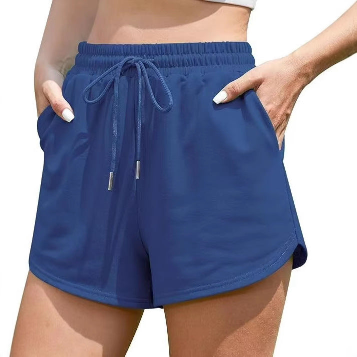 Damer fritidsbyxor i avslappnad skärning med elastisk midja och sidofickor Mirla-Eva Jonsson