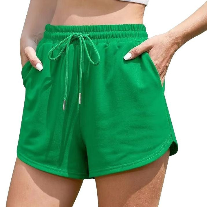 Damer fritidsbyxor i avslappnad skärning med elastisk midja och sidofickor Mirla-Eva Jonsson