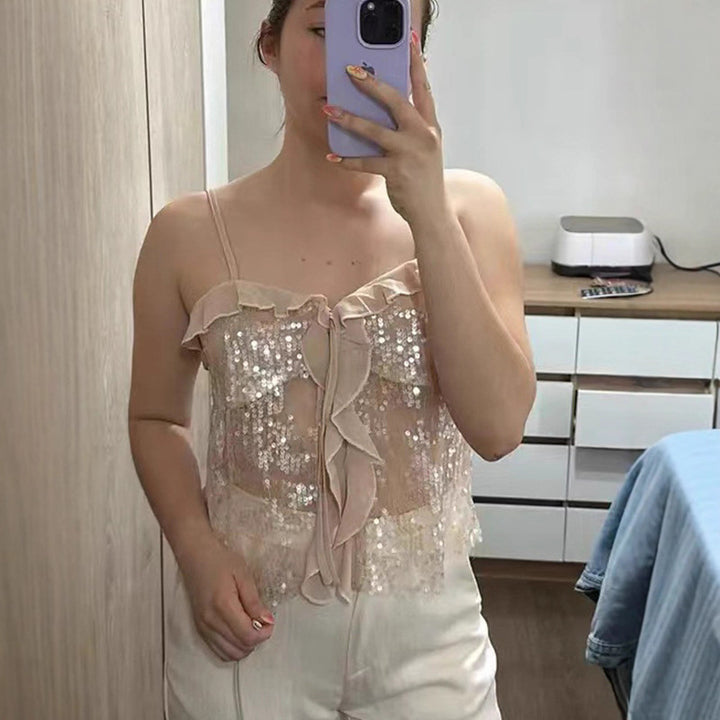 Damer funktionsblus med paljetter och volanger Mirla-Eva Jonsson