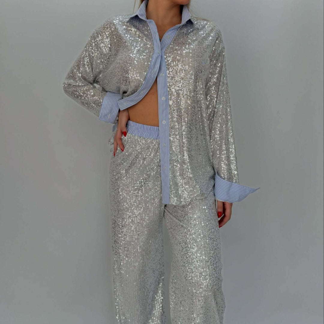 Damer glittrande glitter-outfit med klassisk skjorta och vid skärning Mirla-Eva Jonsson