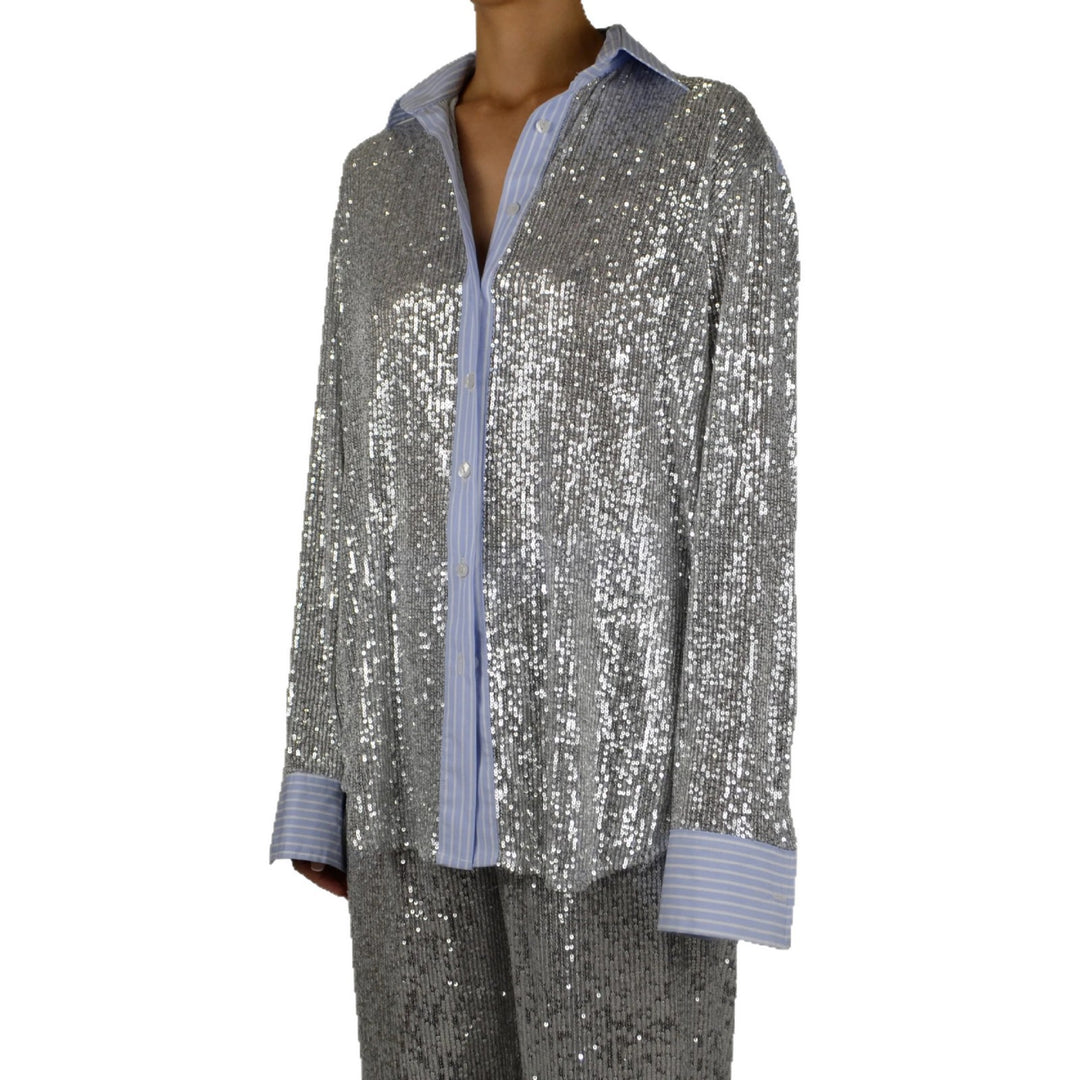 Damer glittrande glitter-outfit med klassisk skjorta och vid skärning Mirla-Eva Jonsson