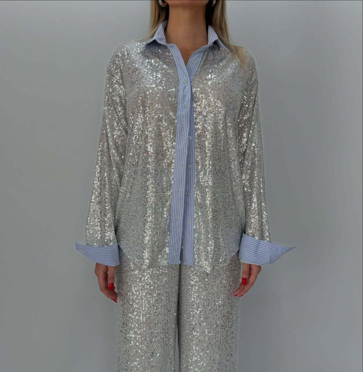 Damer glittrande glitter-outfit med klassisk skjorta och vid skärning Mirla-Eva Jonsson