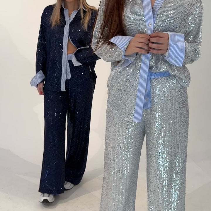 Damer glittrande glitter-outfit med klassisk skjorta och vid skärning Mirla-Eva Jonsson