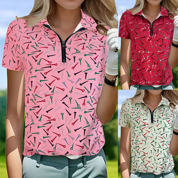 Damer golfpolo med modern dragkedja och livlig design Mirla-Eva Jonsson