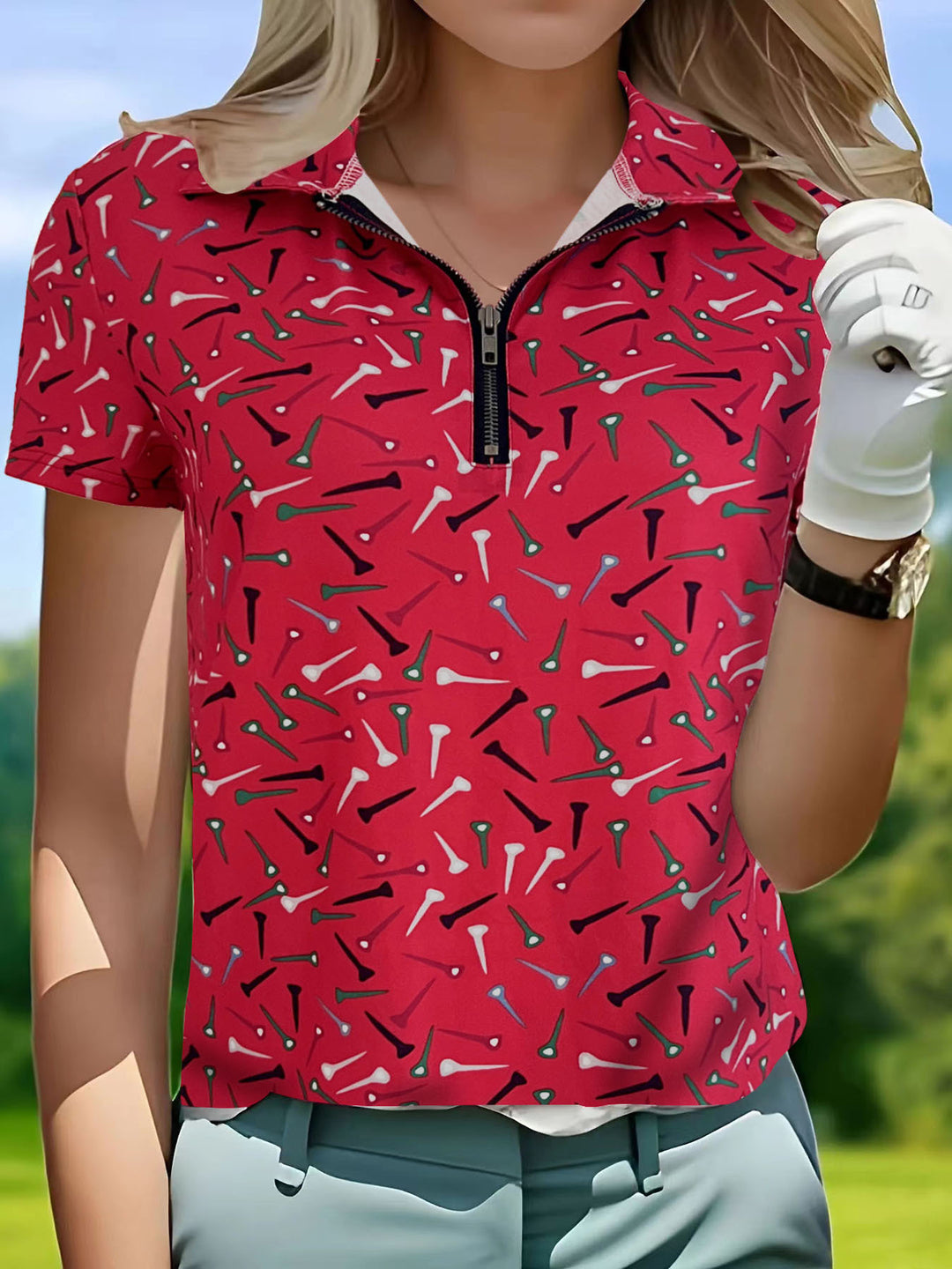 Damer golfpolo med modern dragkedja och livlig design Mirla-Eva Jonsson