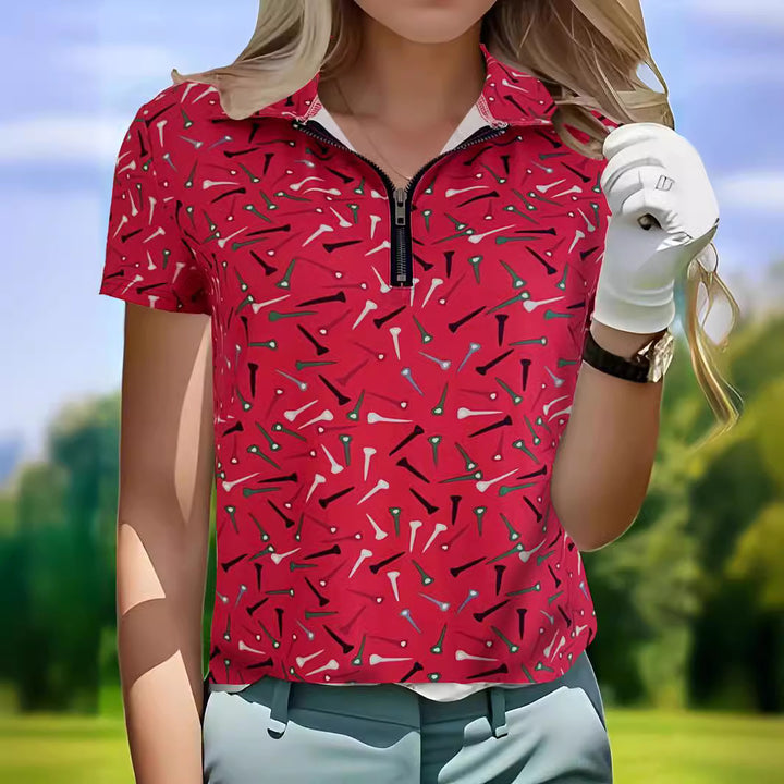 Damer golfpolo med modern dragkedja och livlig design Mirla-Eva Jonsson