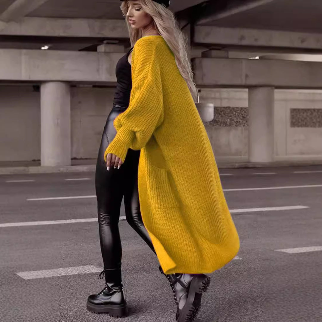 Damer grovstickad cardigan med djupa fickor och avslappnad oversized passform Mirla-Eva Jonsson