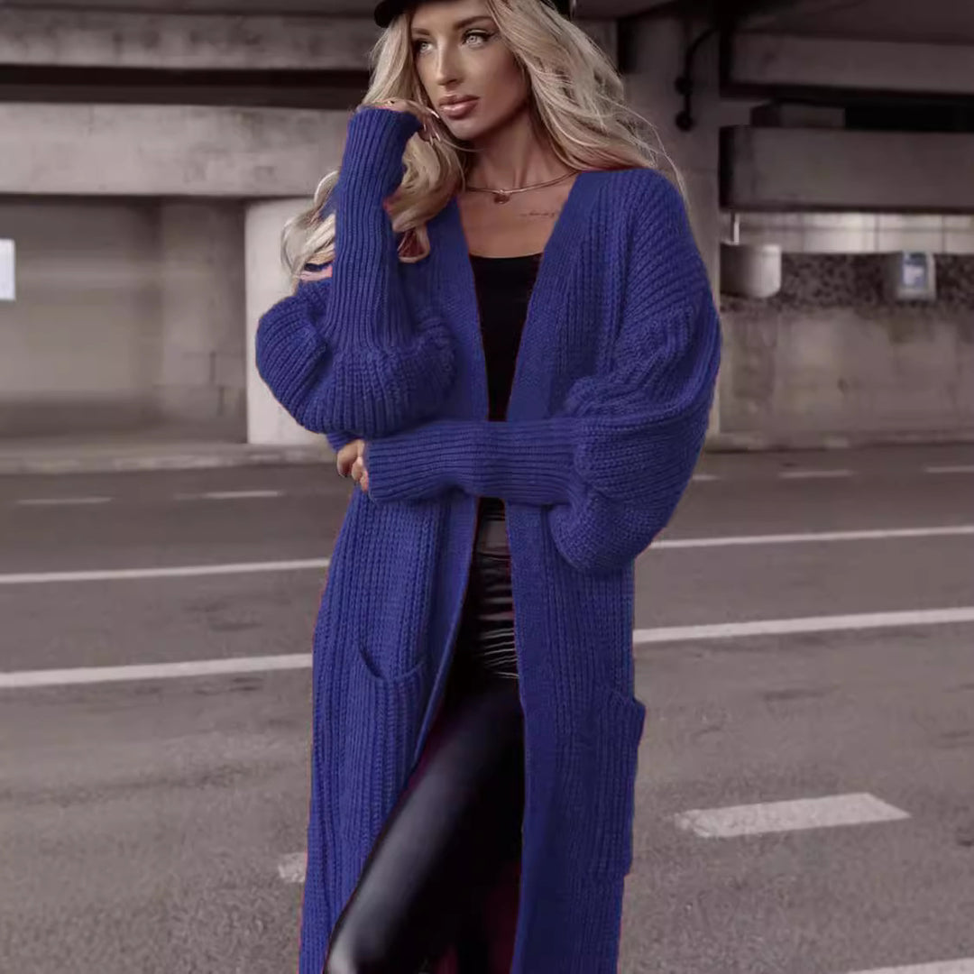 Damer grovstickad cardigan med djupa fickor och avslappnad oversized passform Mirla-Eva Jonsson