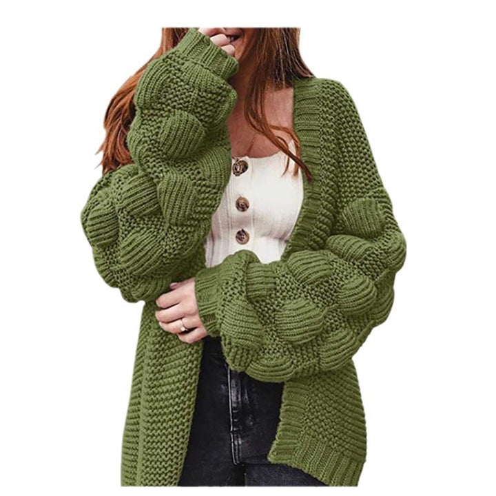 Damer grovstickad cardigan med voluminösa puffärmar och elegant V-hals Mirla-Eva Jonsson