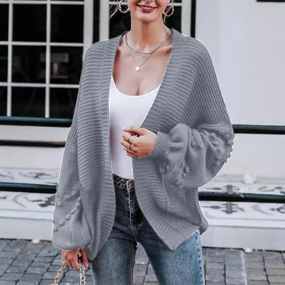 Damer grovstickad cardigan med voluminösa puffärmar och strukturerad yta Eva Jonsson-Eva Jonsson
