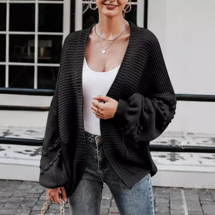 Damer grovstickad cardigan med voluminösa puffärmar och strukturerad yta Eva Jonsson-Eva Jonsson