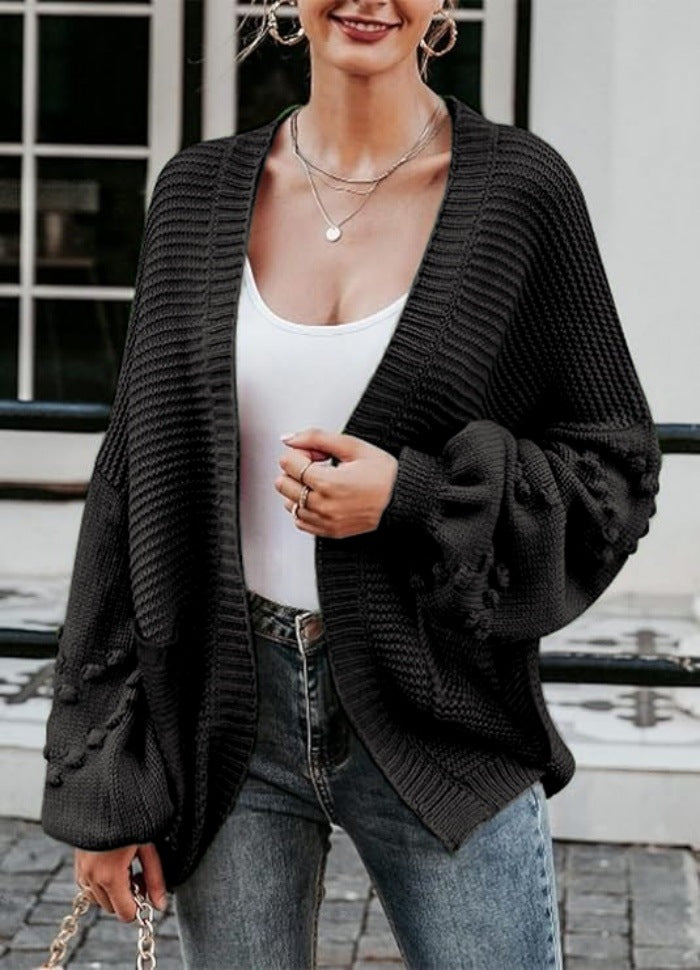 Damer grovstickad cardigan med voluminösa puffärmar och strukturerad yta Eva Jonsson-Eva Jonsson