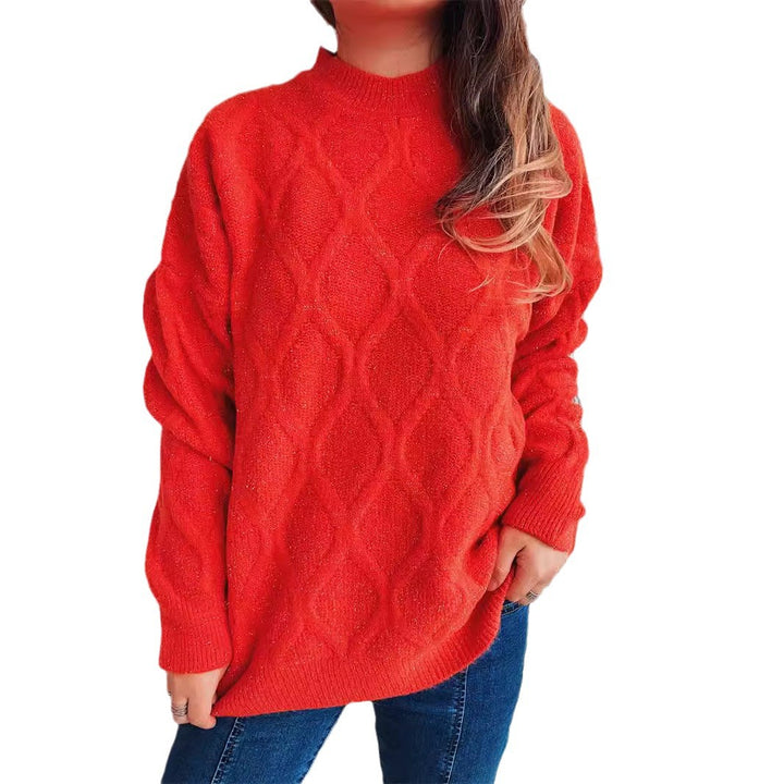 Damer grovstickad tröja med elegant rombmönster och voluminösa ärmar Mirla-Eva Jonsson