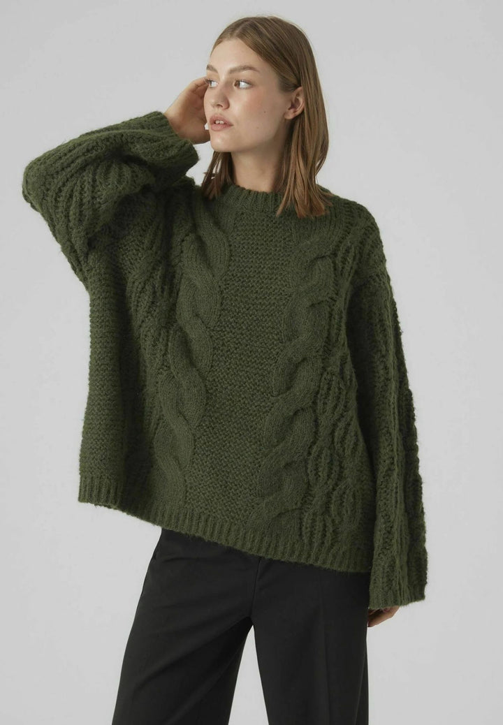 Damer grovstickad tröja med oversized skärning och konstfullt flätmönster Mirla-Eva Jonsson