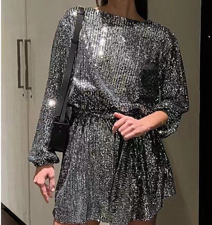 Damer högblanka aftonklänning med gnistrande detaljer Mirla-Eva Jonsson