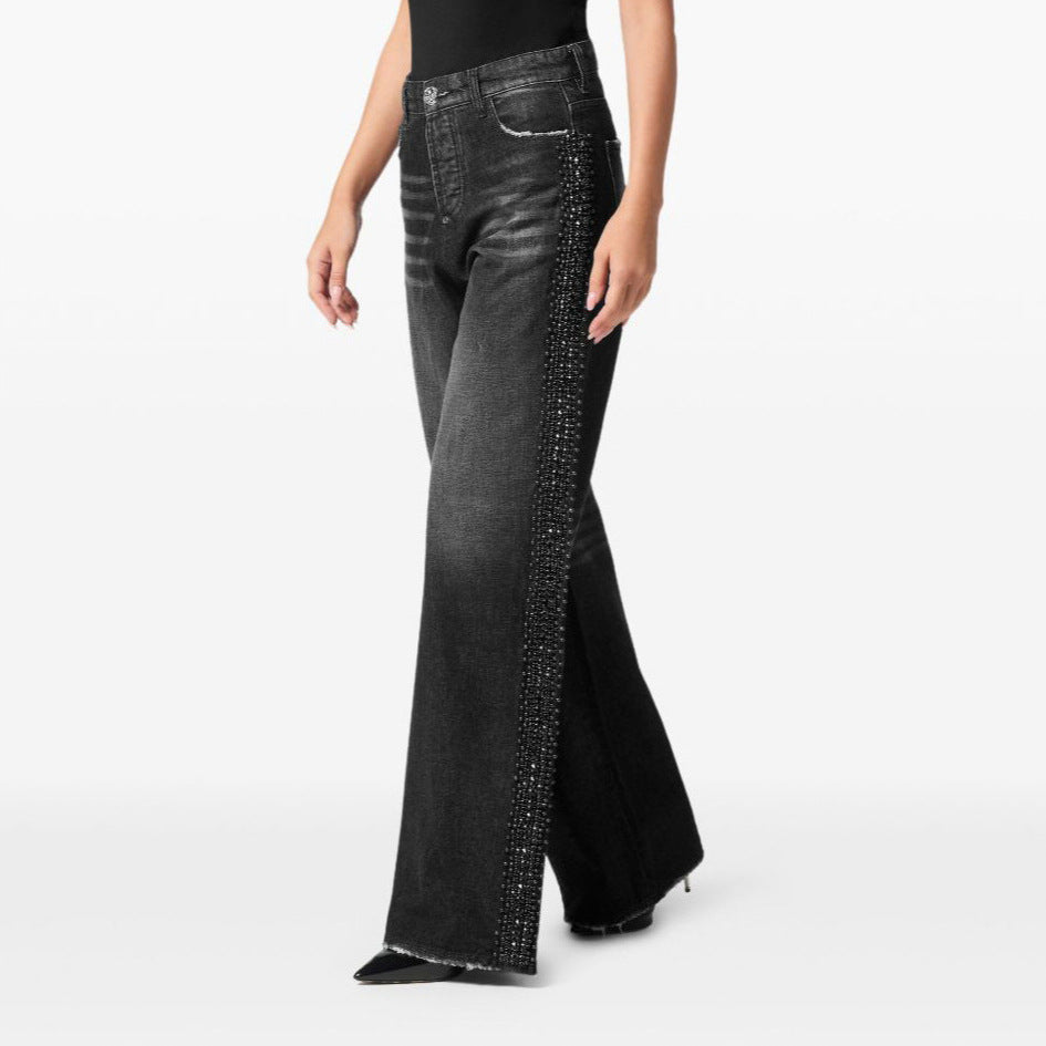 Damer högmidjade jeans med glittrande strassdetaljer Mirla-Eva Jonsson