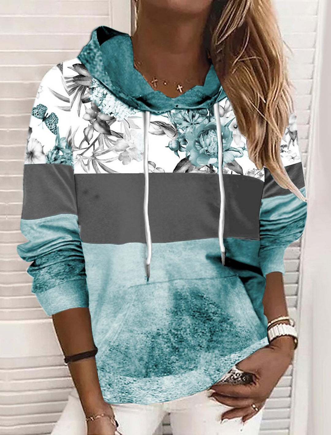 Damer hooded sweatshirt med blommig design och färgblock Mirla-Eva Jonsson