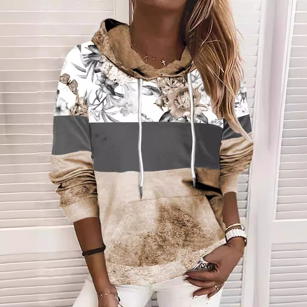 Damer hooded sweatshirt med blommig design och färgblock Mirla-Eva Jonsson