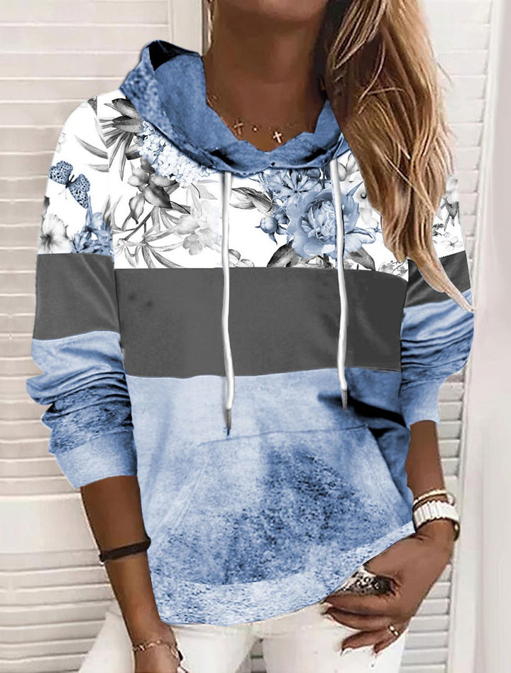 Damer hooded sweatshirt med blommig design och färgblock Mirla-Eva Jonsson