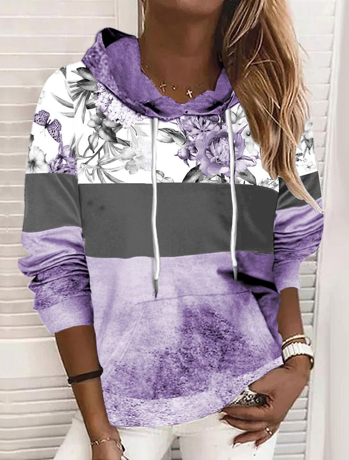 Damer hooded sweatshirt med blommig design och färgblock Mirla-Eva Jonsson