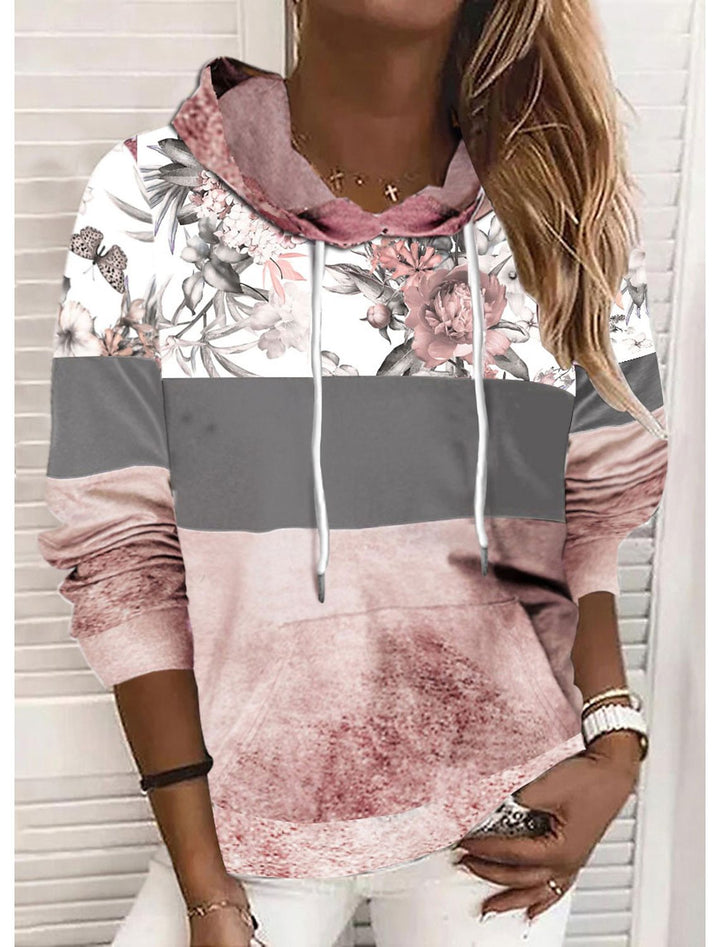 Damer hooded sweatshirt med blommig design och färgblock Mirla-Eva Jonsson